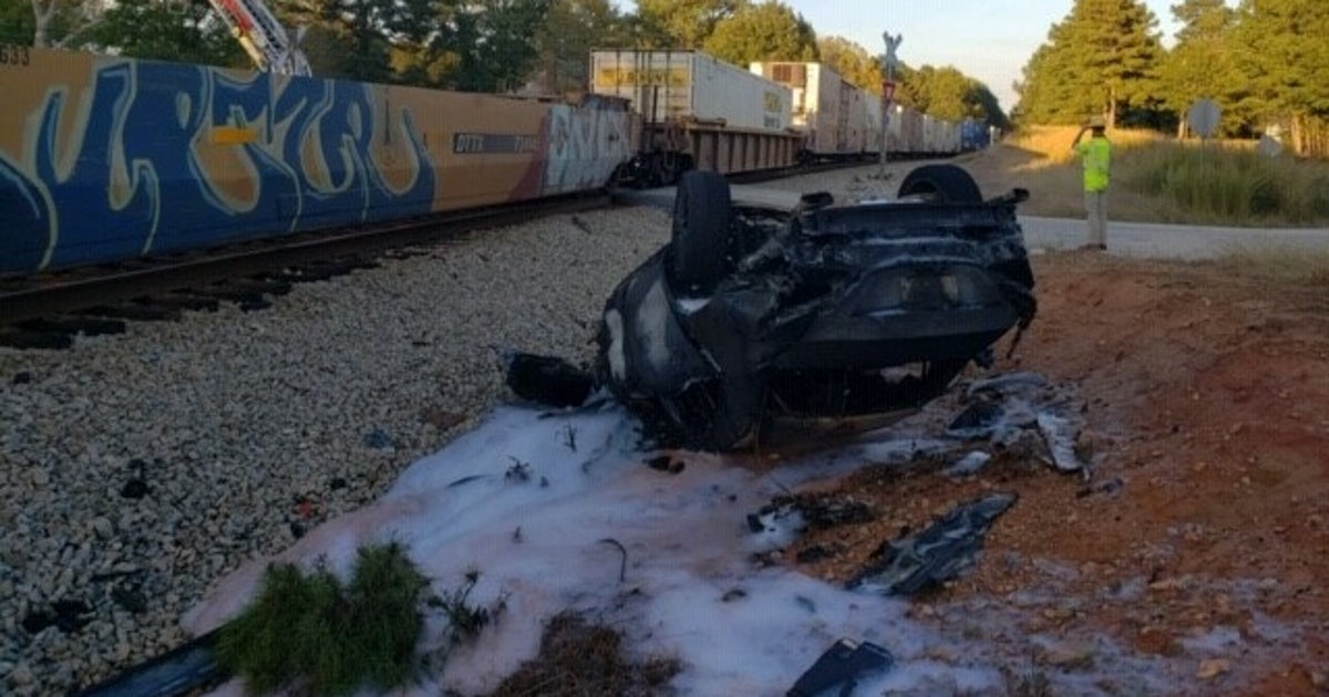 Train strikes car, flips it in Coweta County | FOX 5 Atlanta