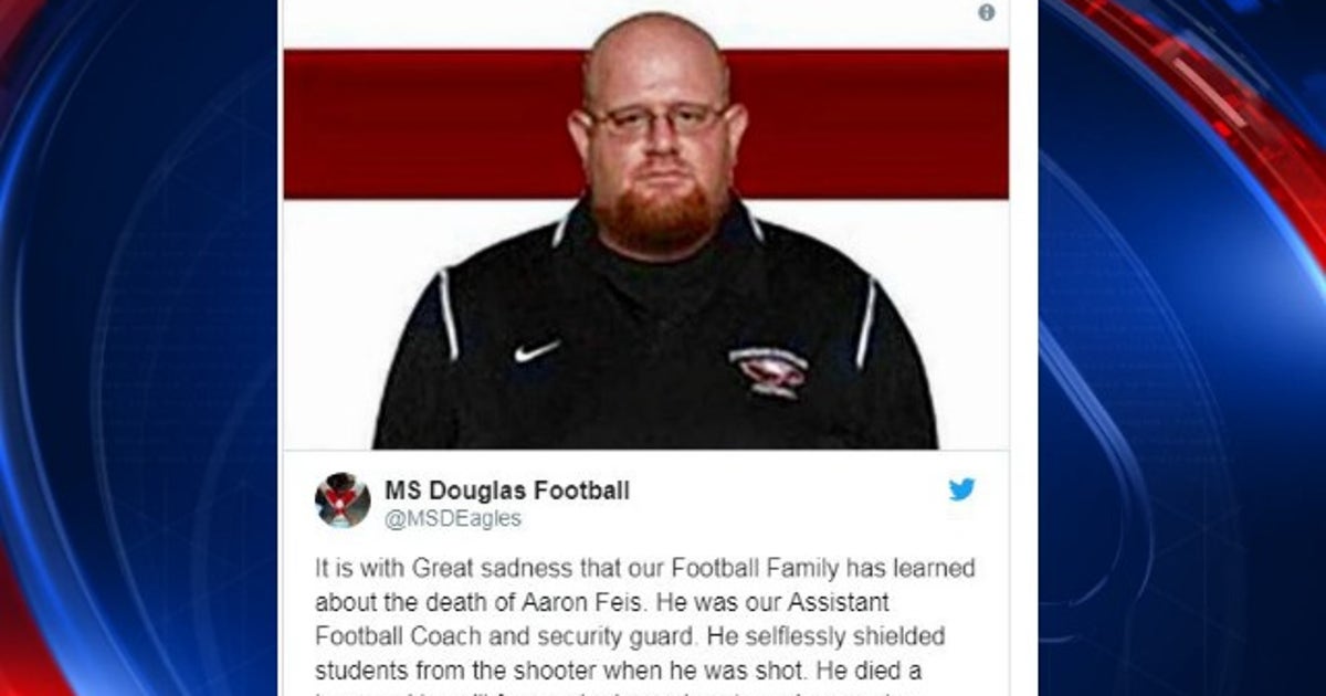 Florida high school football coach seen shielding students from gunfire ...