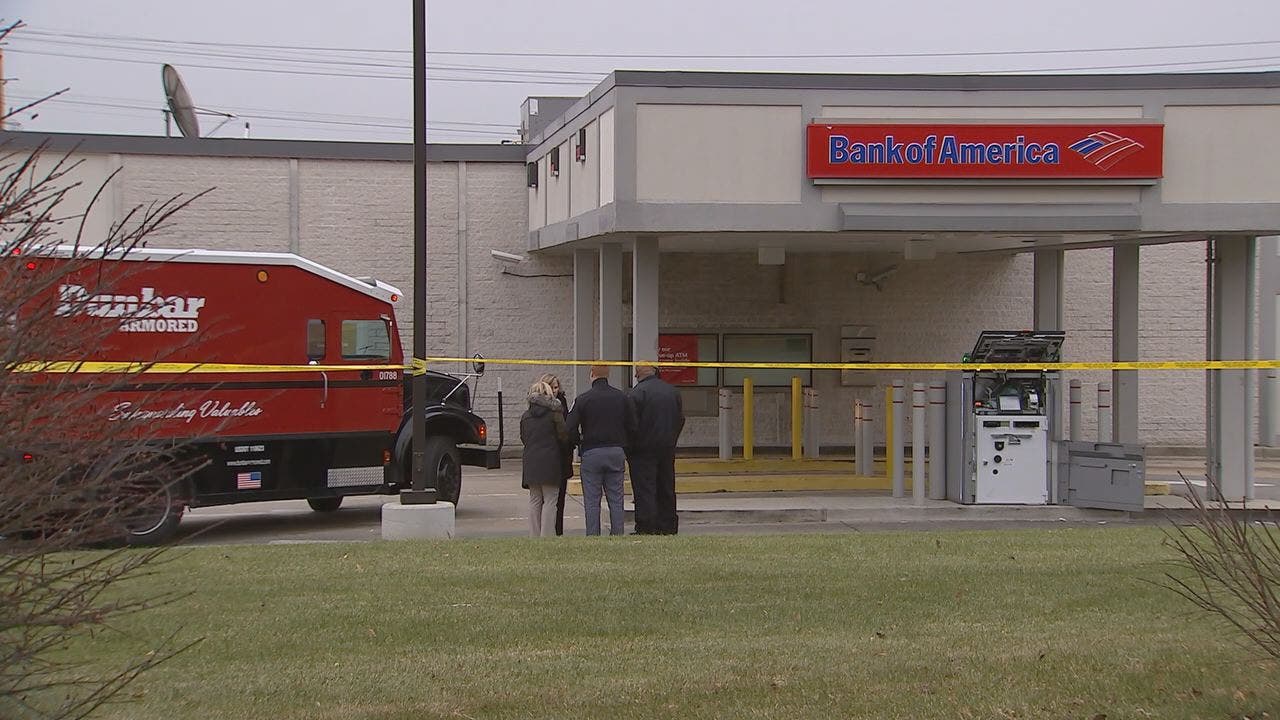 Armored vehicle robbed by armed gunmen outside of Bank of America in