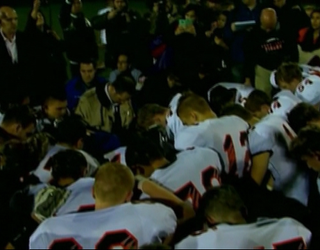WA__PRAYING_COACH_PUT_ON_PAID_LEAVE__REAX__VO_SOT___4NV8950A.mp4_00.00.06.29_1446126520249.png