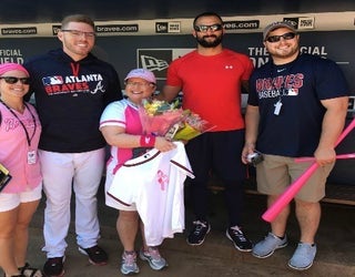 She's honorary bat girl for Atlanta Braves