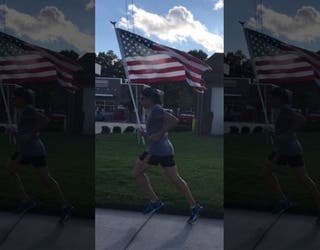 Wayne Parfitt_running with flag 2_100418_1538665346584.jpg-402429.jpg