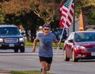 Wayne Parfitt_running with flag 1_100418_1538665346583.jpg-402429.jpg