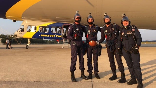 Air Force Academy pilots jump out of blimp for game day
