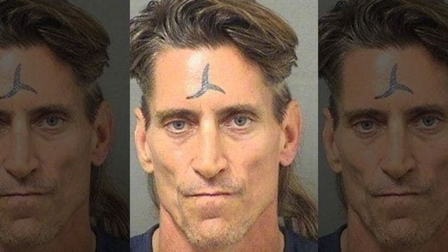 Suspect arrested after man found dead next to three-foot sword