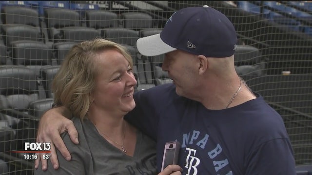 Doctors gave him 3 months to live; 8 months later, he throws first pitch at Rays game