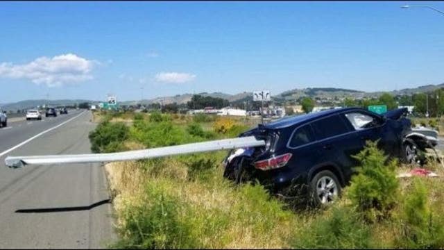 Guardrail impales SUV, injures passenger