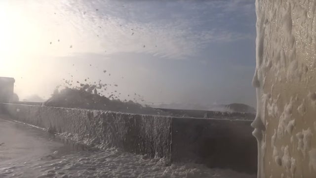 French coastal town inundated by sea foam