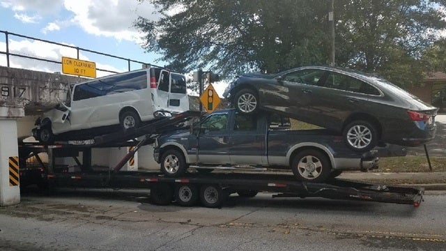 Low clearance: Truck gets stuck at Fairburn train overpass