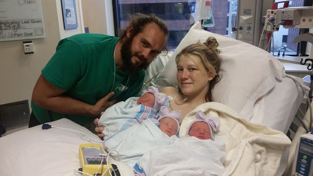 Mother's heart stops while giving birth to rare identical triplets