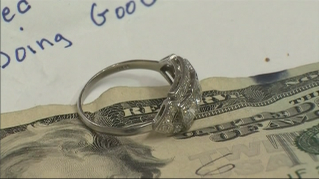 Mystery Woman Leaves $3K Diamond Ring in Red Kettle