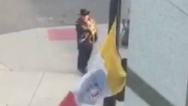 Taps played outside police headquarters to honor fallen officer