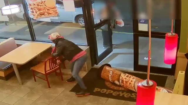 Angry woman smashes windows at Popeye's