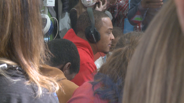 Rapper T.I. makes series of surprise holiday visits