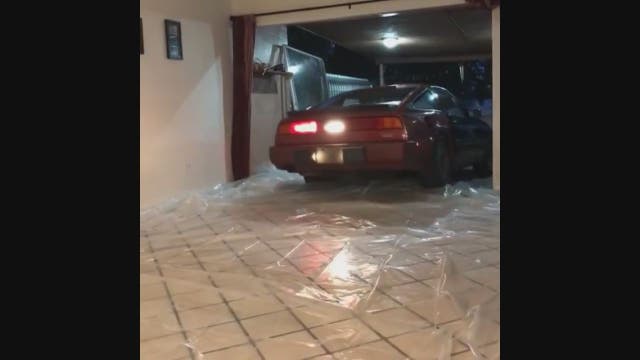 Miami couple's compromise during storm preps ends with car in living room