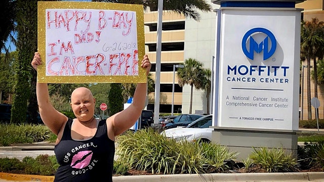 Daughter surprises dad with news she's cancer-free