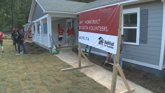 Delta employees dedicate 2 Habitat for Humanity homes
