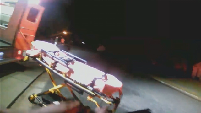 Video: Officers save man from burning home