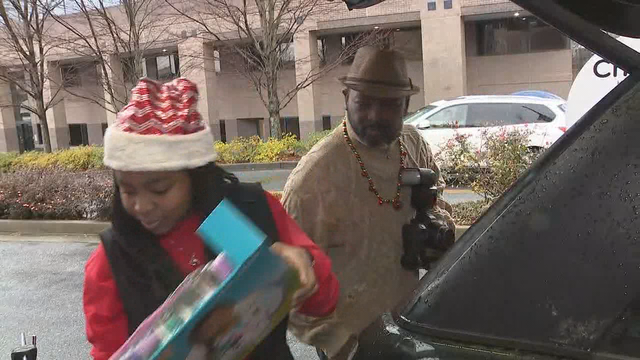Student donates over 200 toys to Children's Healthcare