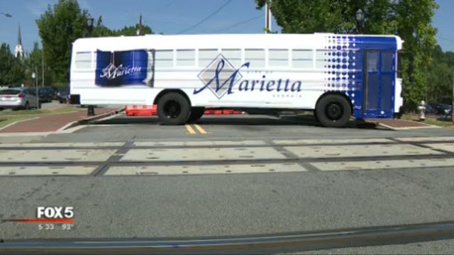 Marietta school buses get makeover for holiday weekend