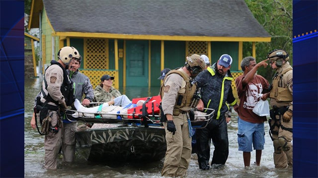 Quadriplegic man, family rescued after being stranded by Harvey