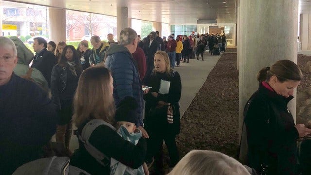 Stranded airport passengers react to power outage