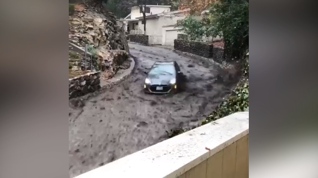 Car 'bobsleds' through mudflow on streets of Burbank