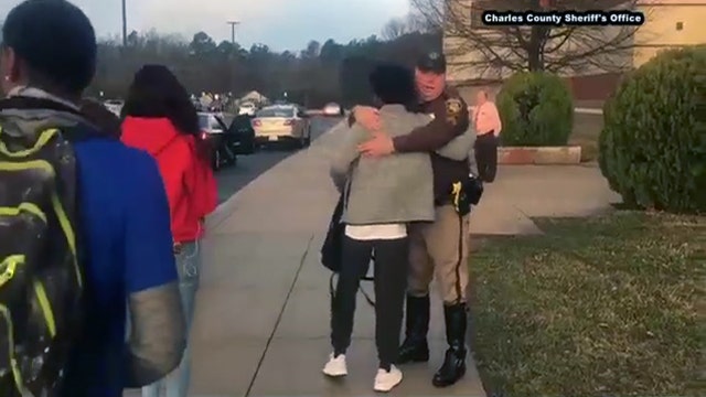 Charles County deputies greet students to show support