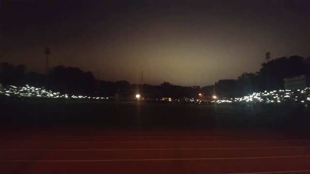 Seniors graduate in the dark due to a blown transformer
