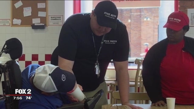 Five Guys manager photographed helping wheel chair-bound man eat, gave order for free