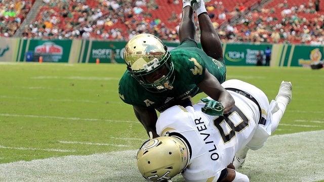 Barnett produces 4 TDs, helps USF beat Georgia Tech 49-38