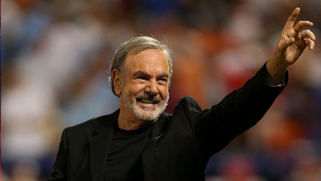 Neil Diamond says he has Parkinson's, retires from touring