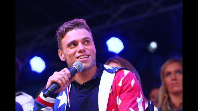 Pride from LGBT community when Olympic skier Gus Kenworthy kisses boyfriend