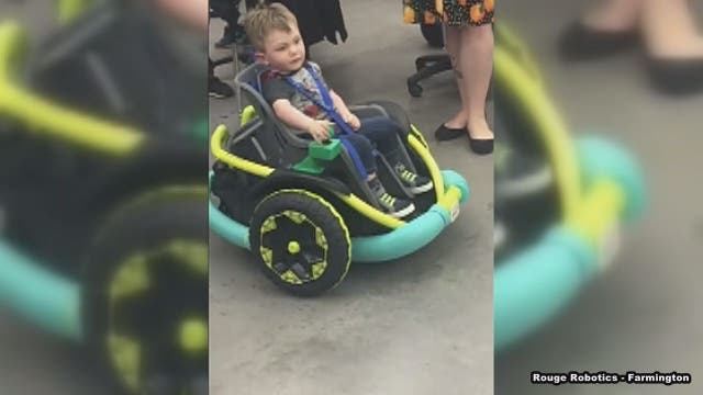 High school robotics team builds power wheelchair for toddler with rare genetic condition