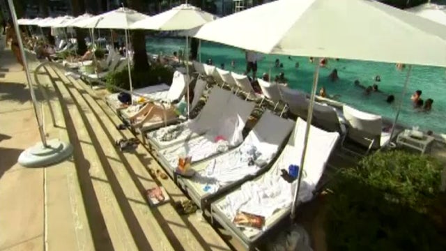 Survey: More Americans are skipping summer vacations this year