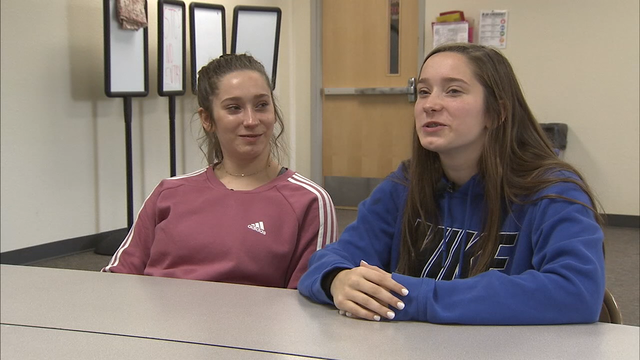 High school students, coaches save life of woman in cardiac arrest