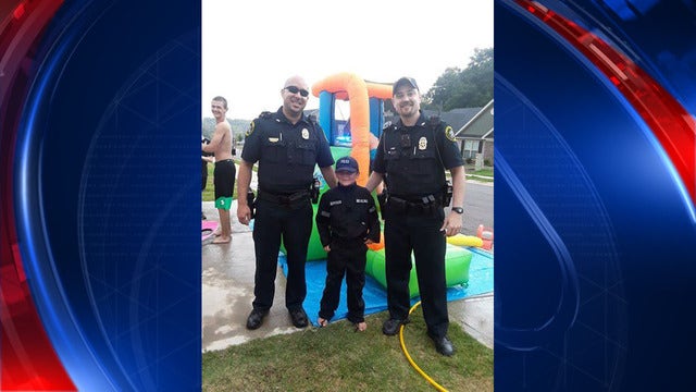 Officers surprise young boy at his police-themed birthday party
