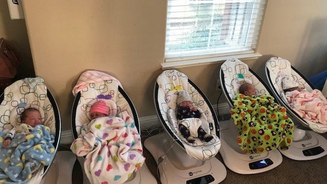 Couple brings home quintuplets, changes 80 diapers a day