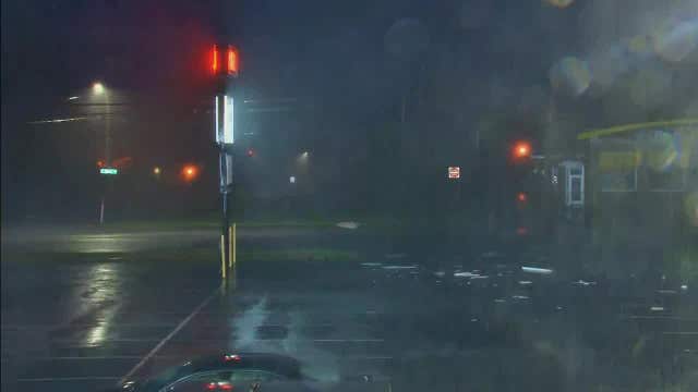 Sign explodes from hurricane winds