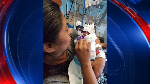 Woman gives birth to boy at Six Flags Over Georgia