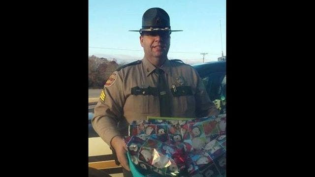 Highway Patrol Officer buys toys for three boys after traffic stop