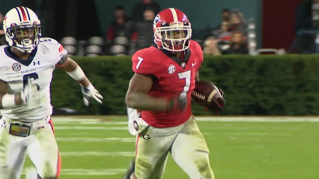 Swift runs for 186 yards, No. 5 Georgia beats Auburn 27-10