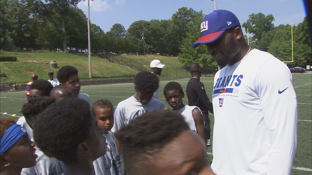 NFL players show Georgia kids game fundamentals