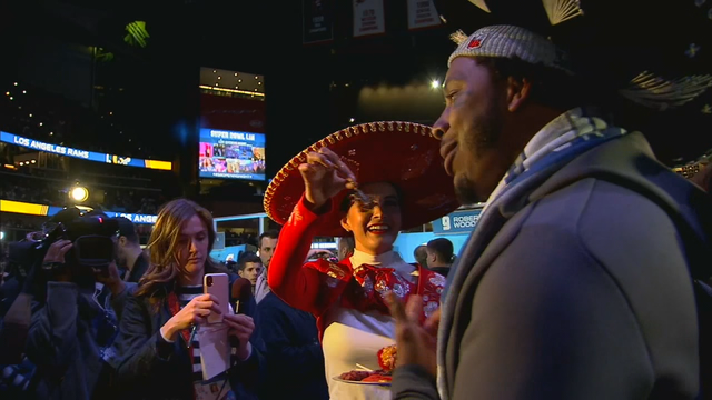 Media night more like a mosh pit and Mardi Gras