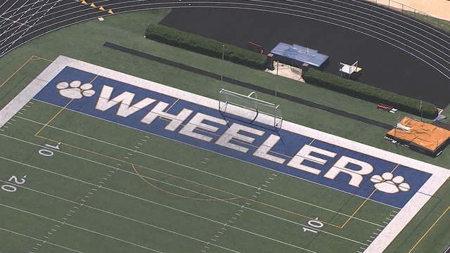 2 students arrested after allegedly bringing gun to Wheeler High School