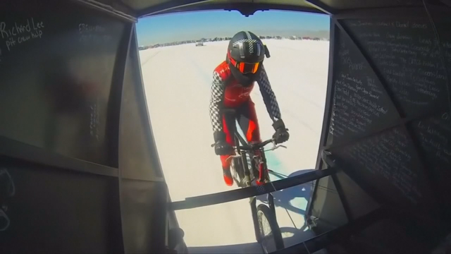 Woman breaks cycling world speed record