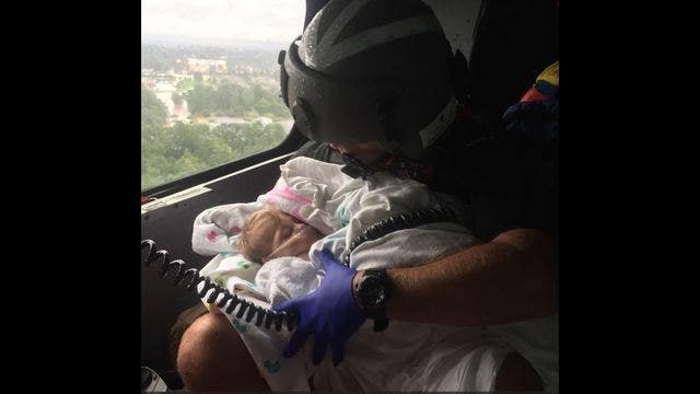 USCG rescues mother and baby from Harvey flooding