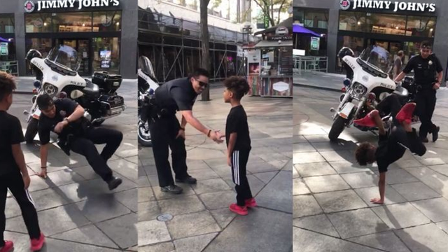 Boy, officer bust out insane moves in break dance face off