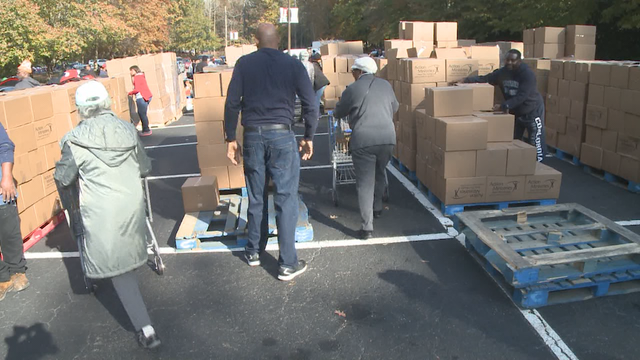 Church gives food boxes to families in need