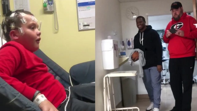 Watch: Georgia boy meets his hero, Nick Chubb, while in the hospital